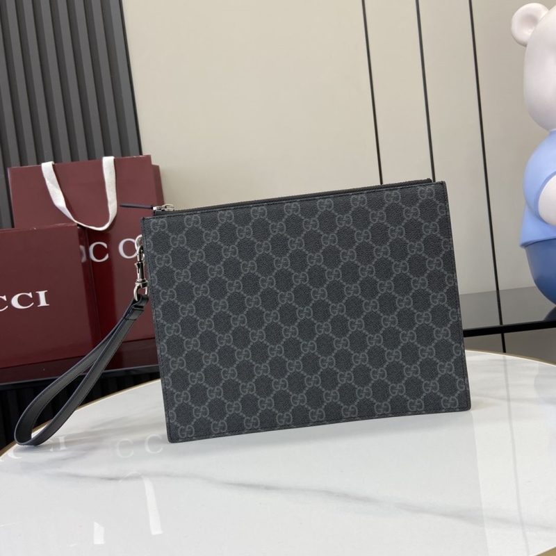 G*u*i clutch bags